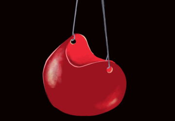 Eine rote NAse ist in Großaufnahme vor einem schwarzen Hintergrund zu sehen.